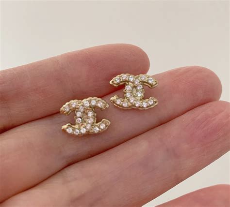 chanel c earrings gold|genuine chanel earrings.